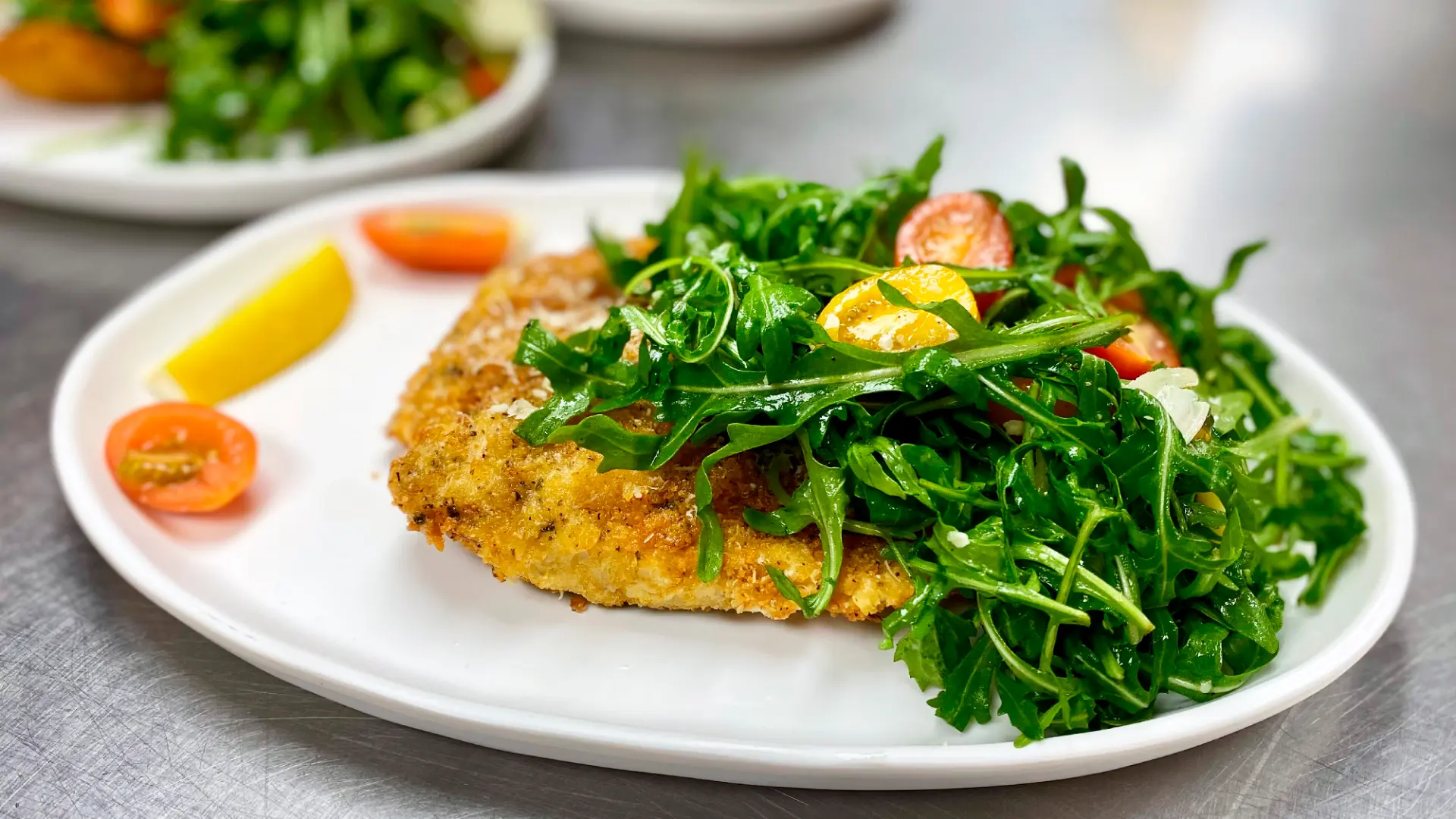 Chicken Milanese with arugula salad at Nick's Wine Bar Cafe