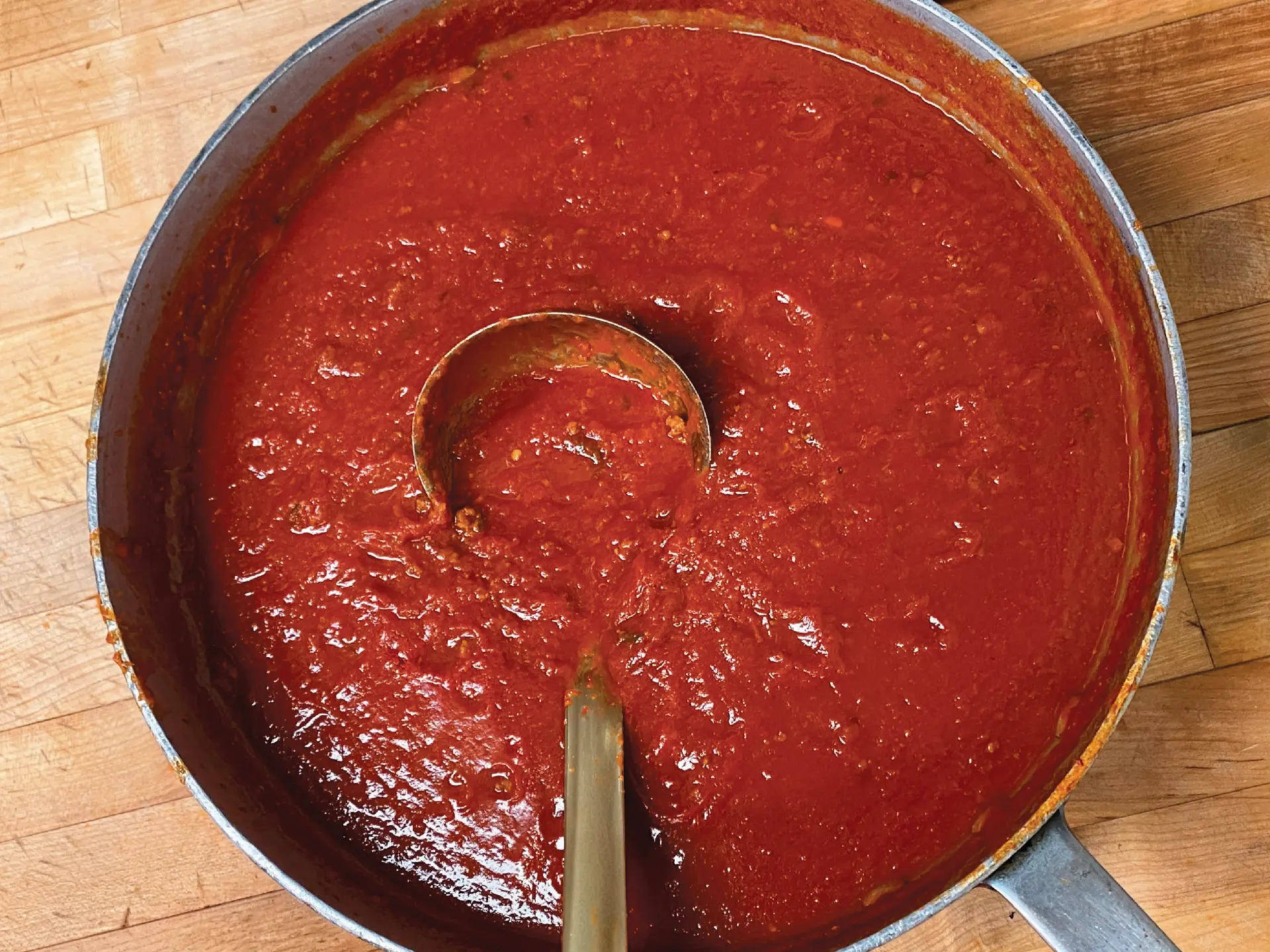 A pot of Angela's Kitchen house-made marinara sauce