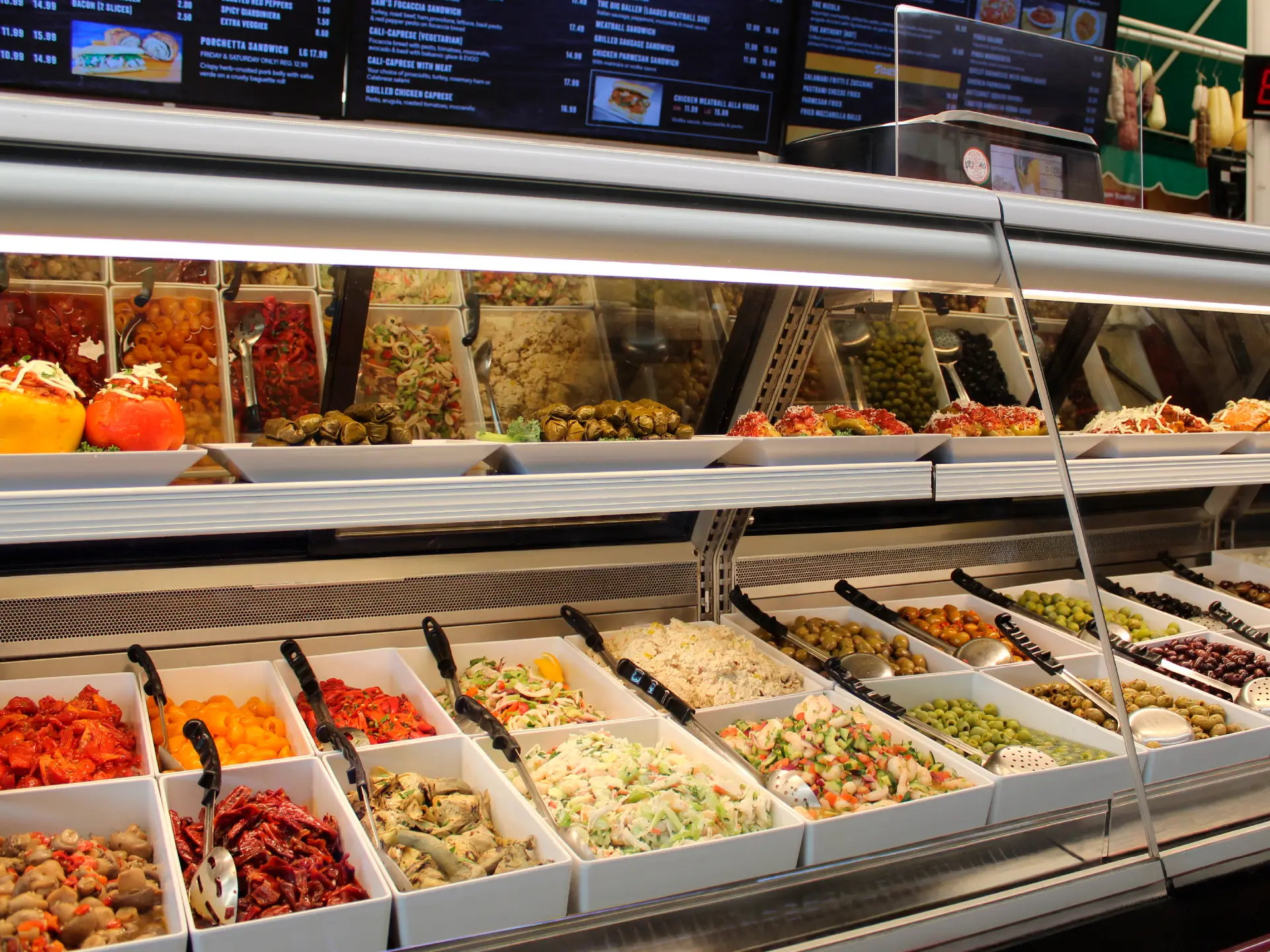 Hand-crafted antipasto with olives, roasted peppers, and marinated vegetables
