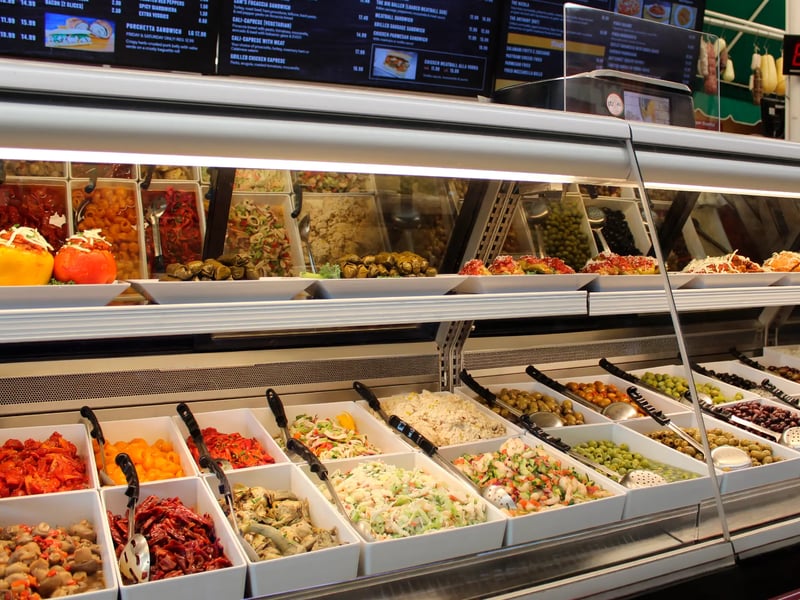 Hand-crafted antipasto with olives, roasted peppers, and marinated vegetables